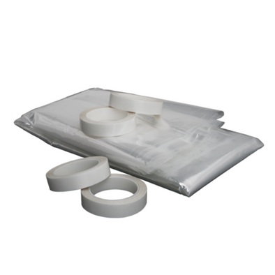 A folded sheet of clear window insulating film and four rolls of double-sided tape.