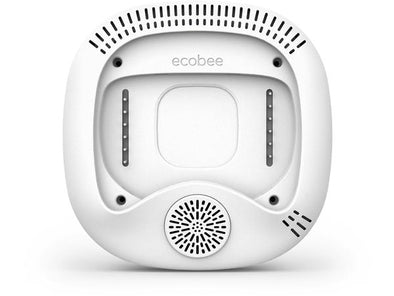 Back view of the thermostat in white with speaker cover visible.