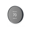Side view of a charcoal Nest Thermostat in heating mode set to 70 degrees, showing indoor temperature of 72 degrees on grey background