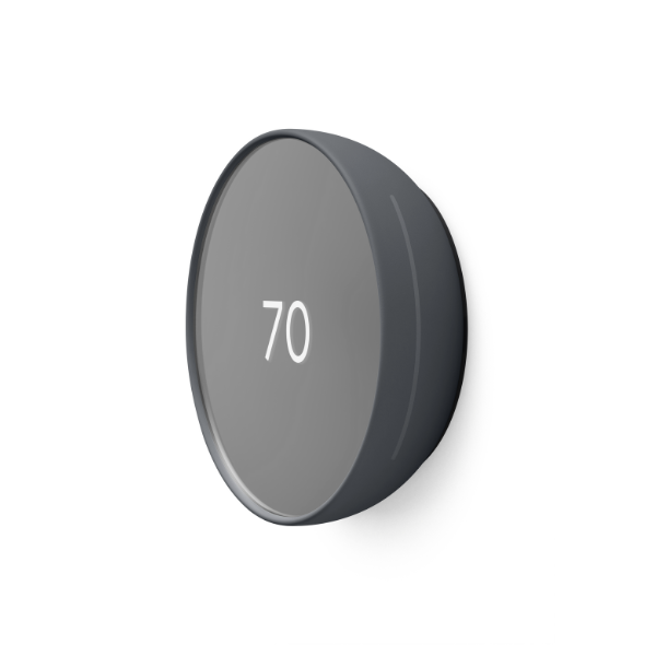 Profile view of charcoal Nest Thermostat showing 70 degrees