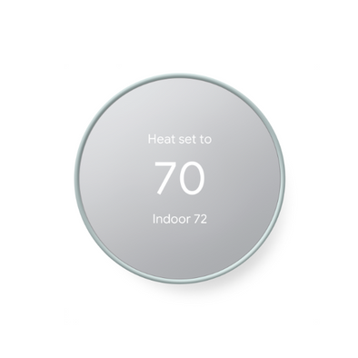 Fog colored Nest Thermostat in heating mode set to 70 degrees, showing indoor temperature of 72 degrees on grey background