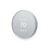 Side view of a fog colored Nest Thermostat in heating mode set to 70 degrees, showing indoor temperature of 72 degrees on grey background