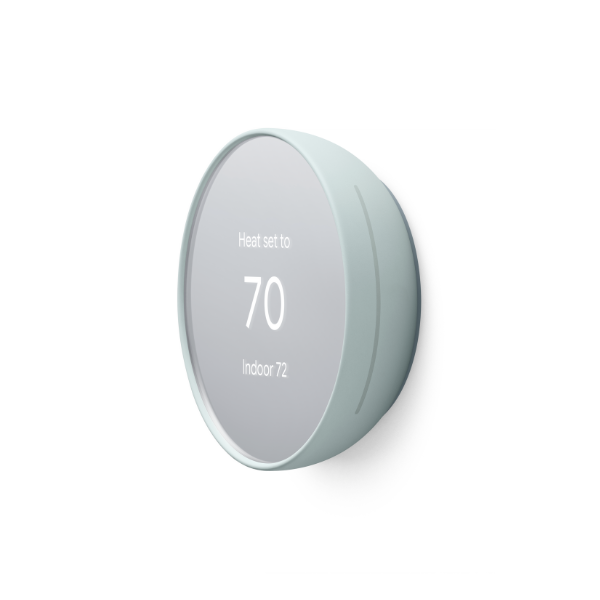 Profile view of a fog colored Nest Thermostat in heating mode set to 70 degrees, showing indoor temperature of 72 degrees on grey background