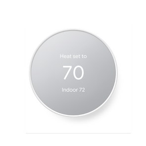 Snow colored Nest Thermostat in heating mode set to 70 degrees, showing indoor temperature of 72 degrees on grey background